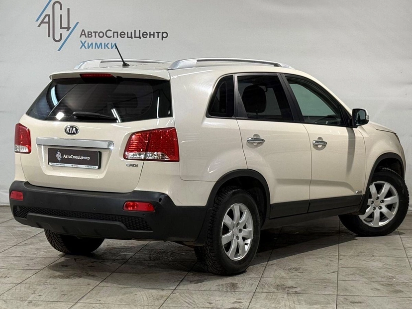Автомобиль Kia Sorento II поколение 2.2d AT 4WD (197 л.с.) Prestige Бежевый 2009 с пробегом 191 000 км