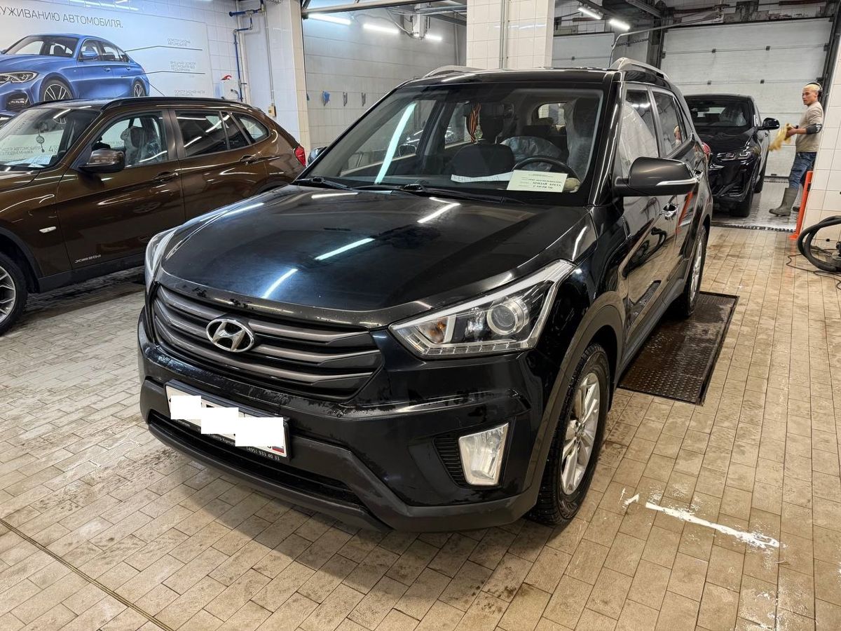 Автомобиль Hyundai Creta I поколение 2.0 AT 4WD (149 л.с.) Travel + Advanced + Style Чёрный 2017 с пробегом 203 941 км