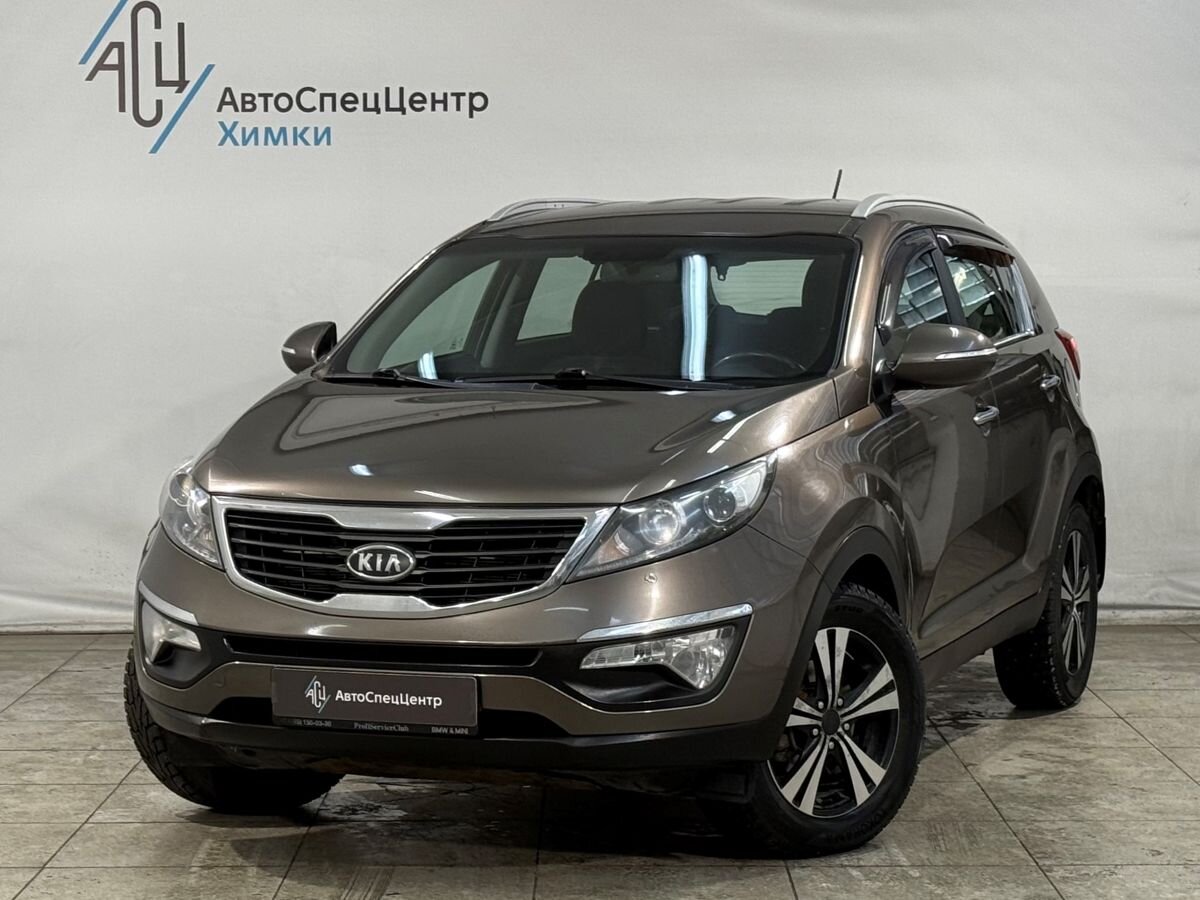 Автомобиль Kia Sportage III поколение 2.0 AT (150 л.с.) Comfort Коричневый 2013 с пробегом 134 000 км