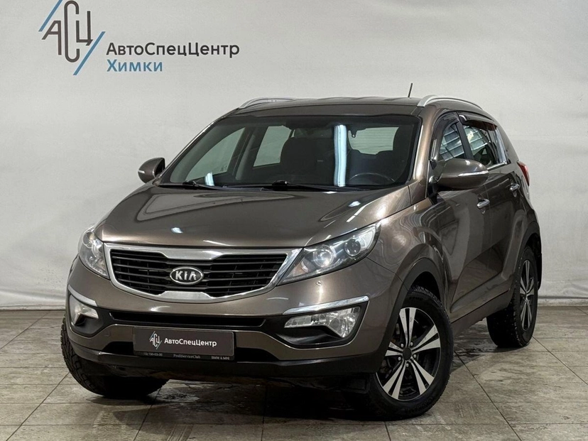 Автомобиль Kia Sportage III поколение 2.0 AT (150 л.с.) Comfort Коричневый 2013 с пробегом 134 000 км