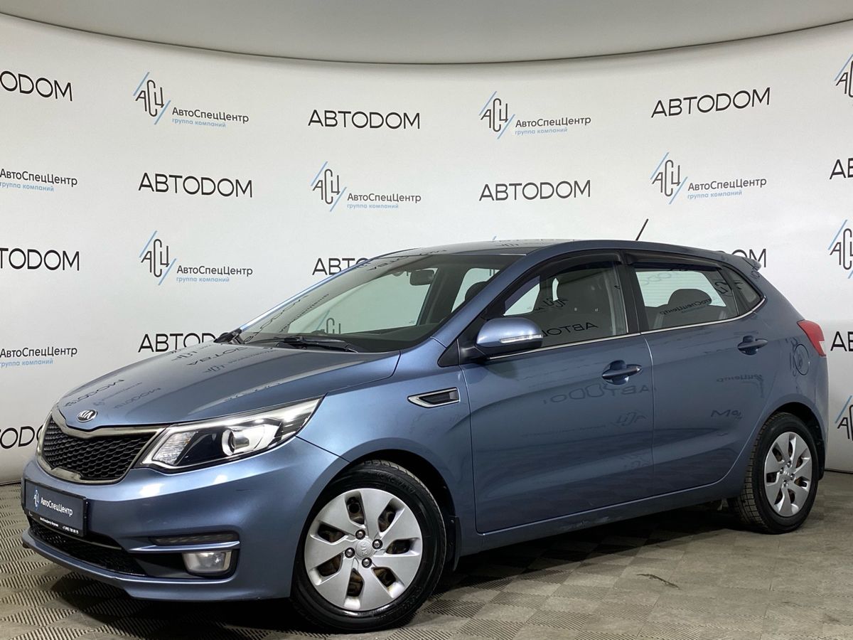 Автомобиль Kia Rio III [рестайлинг] 1.6 AT (123 л.с.) Prestige Голубой 2015 с пробегом 128 650 км