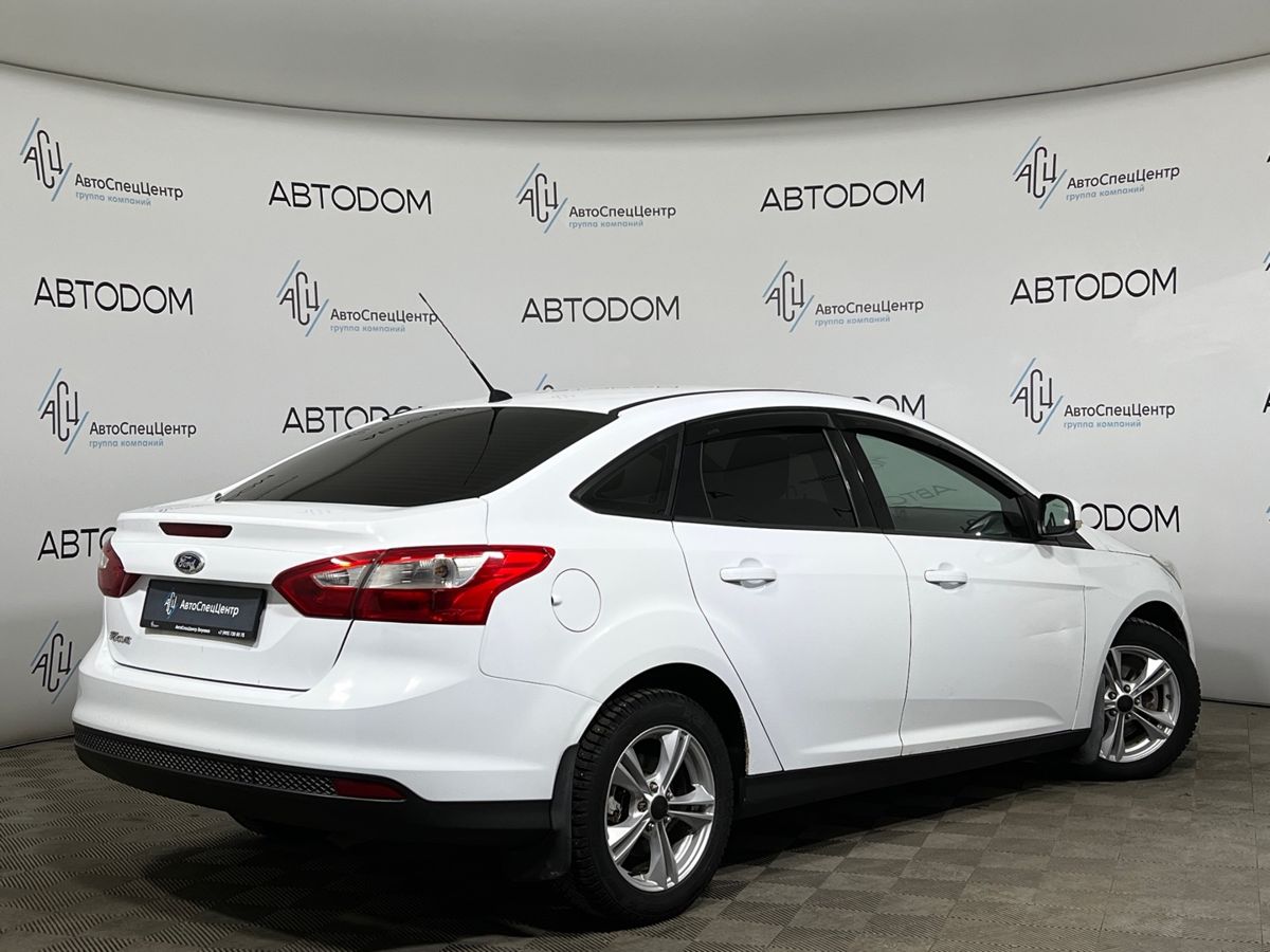 Автомобиль Ford Focus III поколение 1.6 AMT (105 л.с.) Trend Белый 2012 с пробегом 171 934 км