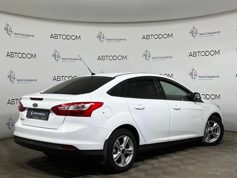 Автомобиль Ford Focus III поколение 1.6 AMT (105 л.с.) Trend Белый 2012 с пробегом 171 934 км