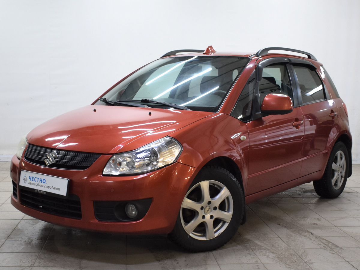 Автомобиль Suzuki SX4 I поколение 1.6 AT (107 л.с.) Base Оранжевый 2008 с пробегом 153000 км