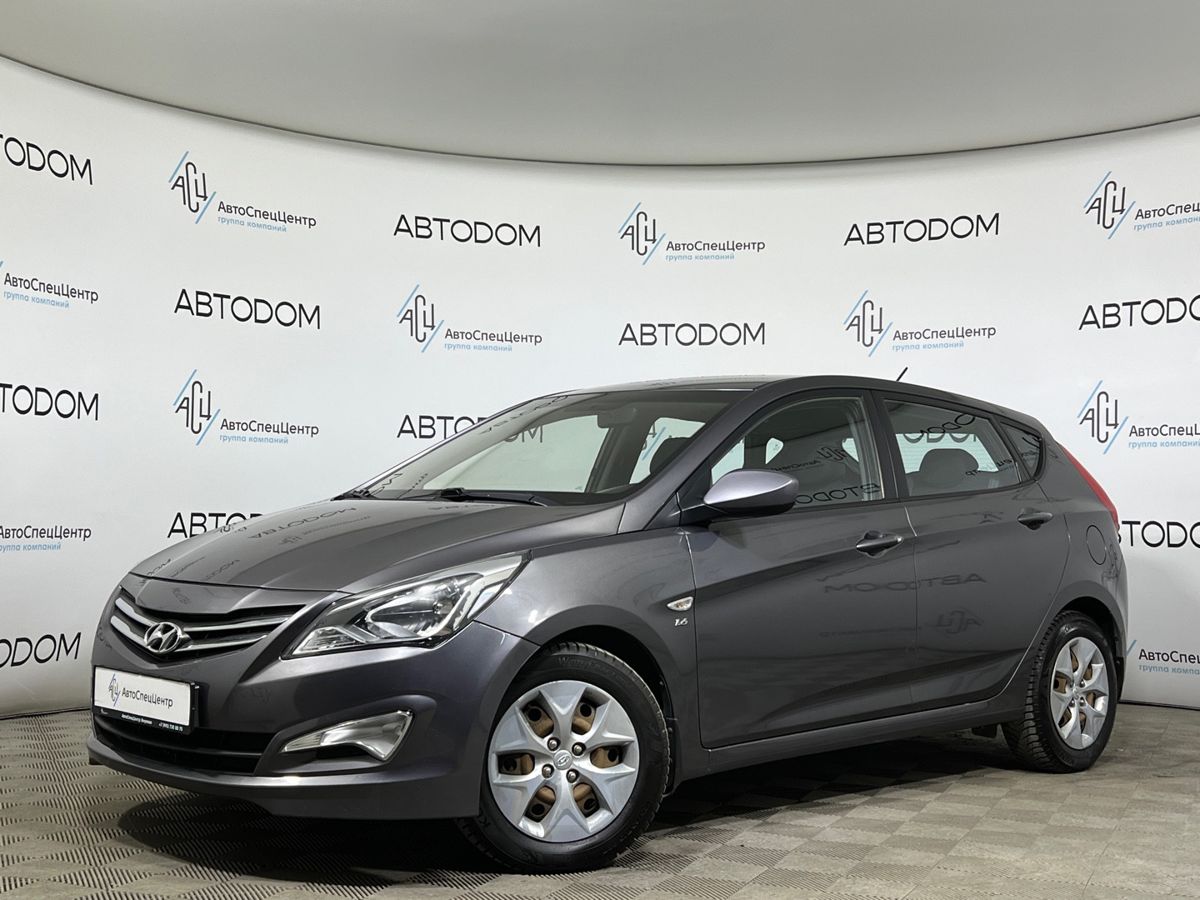 Автомобиль Hyundai Solaris I [рестайлинг] 1.6 AT (123 л.с.) Comfort Серый 2015 с пробегом 122 448 км