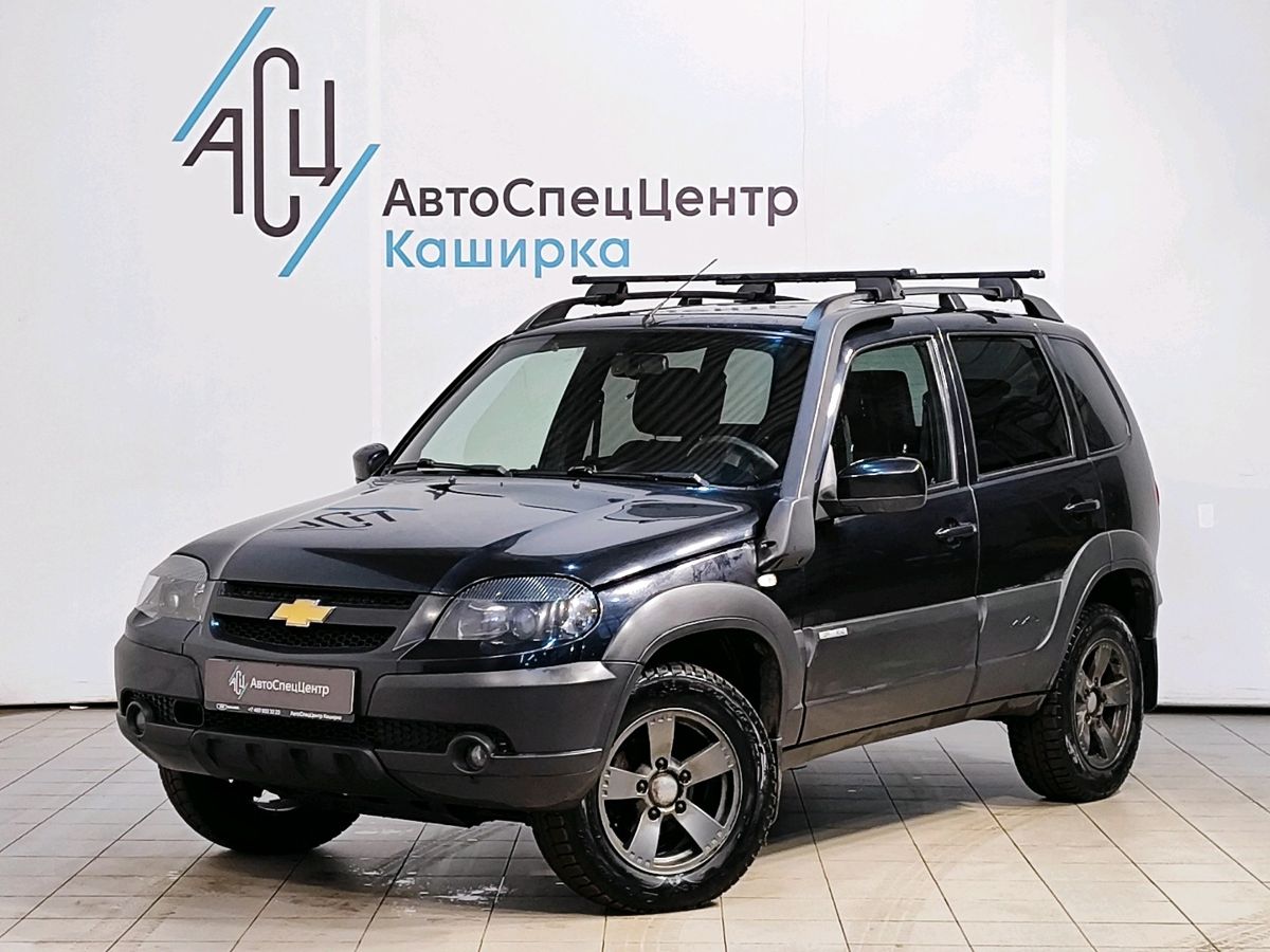 Автомобиль Chevrolet Niva I [рестайлинг] 1.7 MT 4WD (80 л.с.) LE+ Чёрный 2018 с пробегом 100 667 км