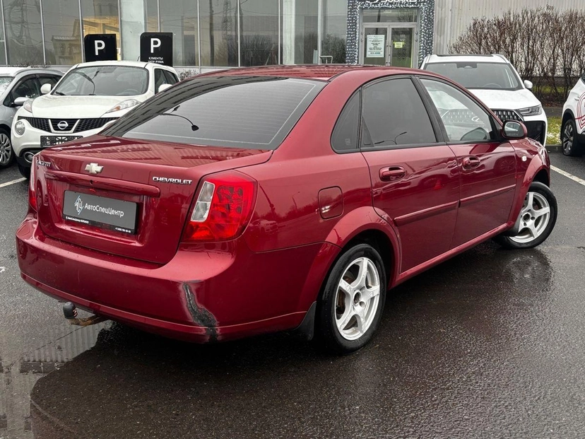 Автомобиль Chevrolet Lacetti I поколение 1.4 MT (95 л.с.) Star Красный 2009 с пробегом 189 355 км