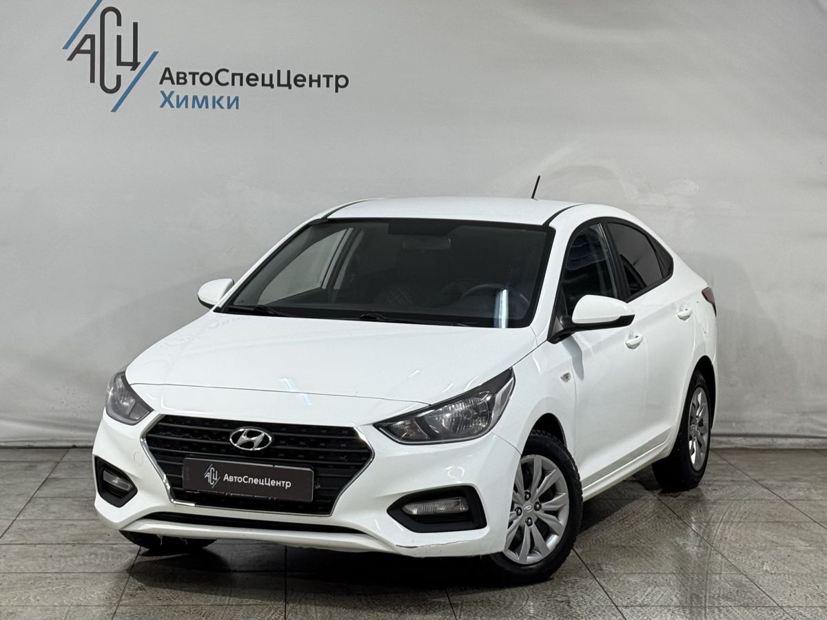 Автомобиль Hyundai Solaris II поколение 1.6 AT (123 л.с.) Comfort Белый 2019 с пробегом 94 000 км
