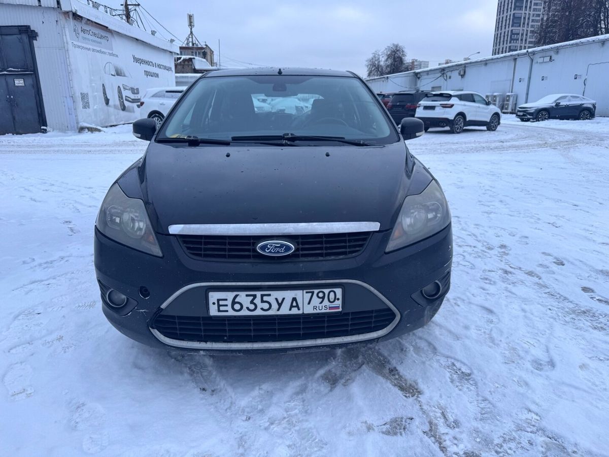 Автомобиль Ford Focus II [рестайлинг] 2.0 AT (145 л.с.) Comfort Чёрный 2010 с пробегом 246 620 км