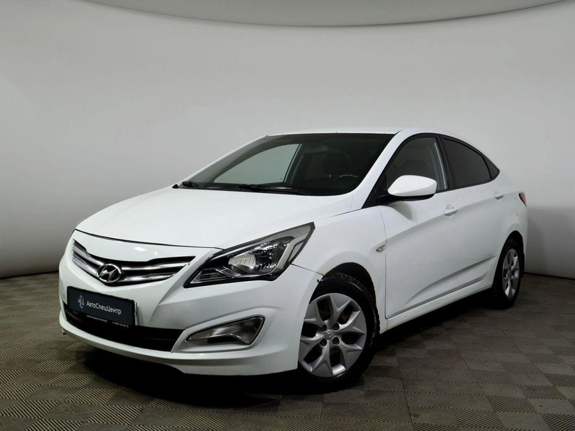 Автомобиль Hyundai Solaris I [рестайлинг] 1.6 AT (123 л.с.) Elegance Белый 2015 с пробегом 103 677 км