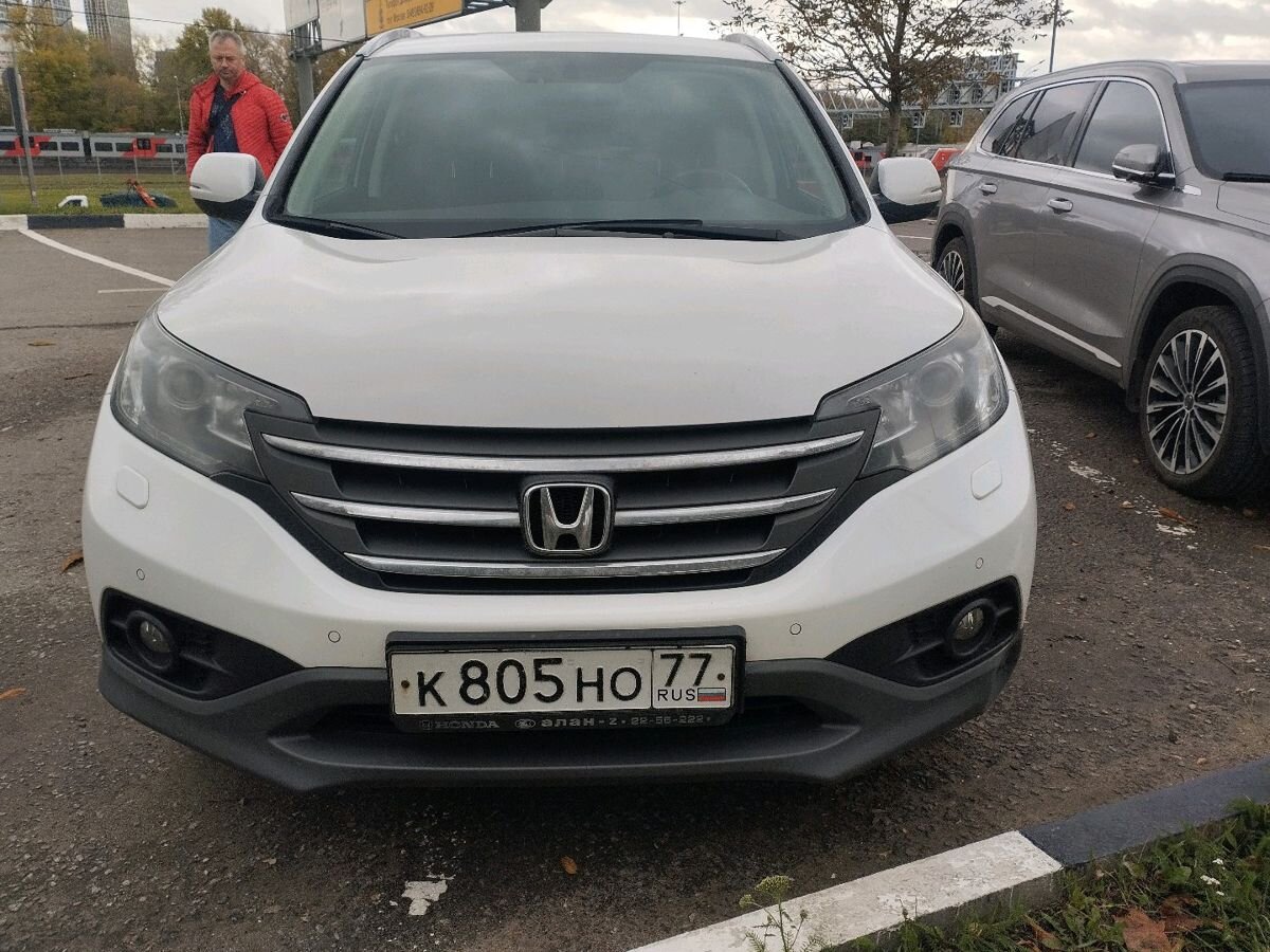Honda CR-V IV поколение 2.0 AT 4WD (150 л.с.) Lifestyle Белый 2012 с пробегом 141 927 км
