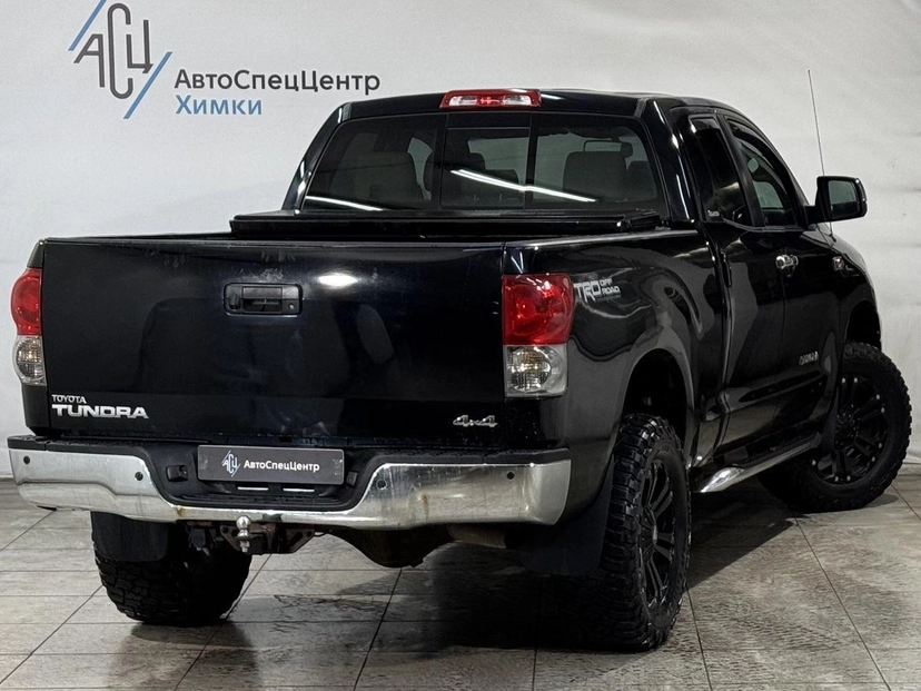 Автомобиль Toyota Tundra II поколение 5.7 AT 4WD (381 л.с.) Base Чёрный 2007 с пробегом 149 000 км