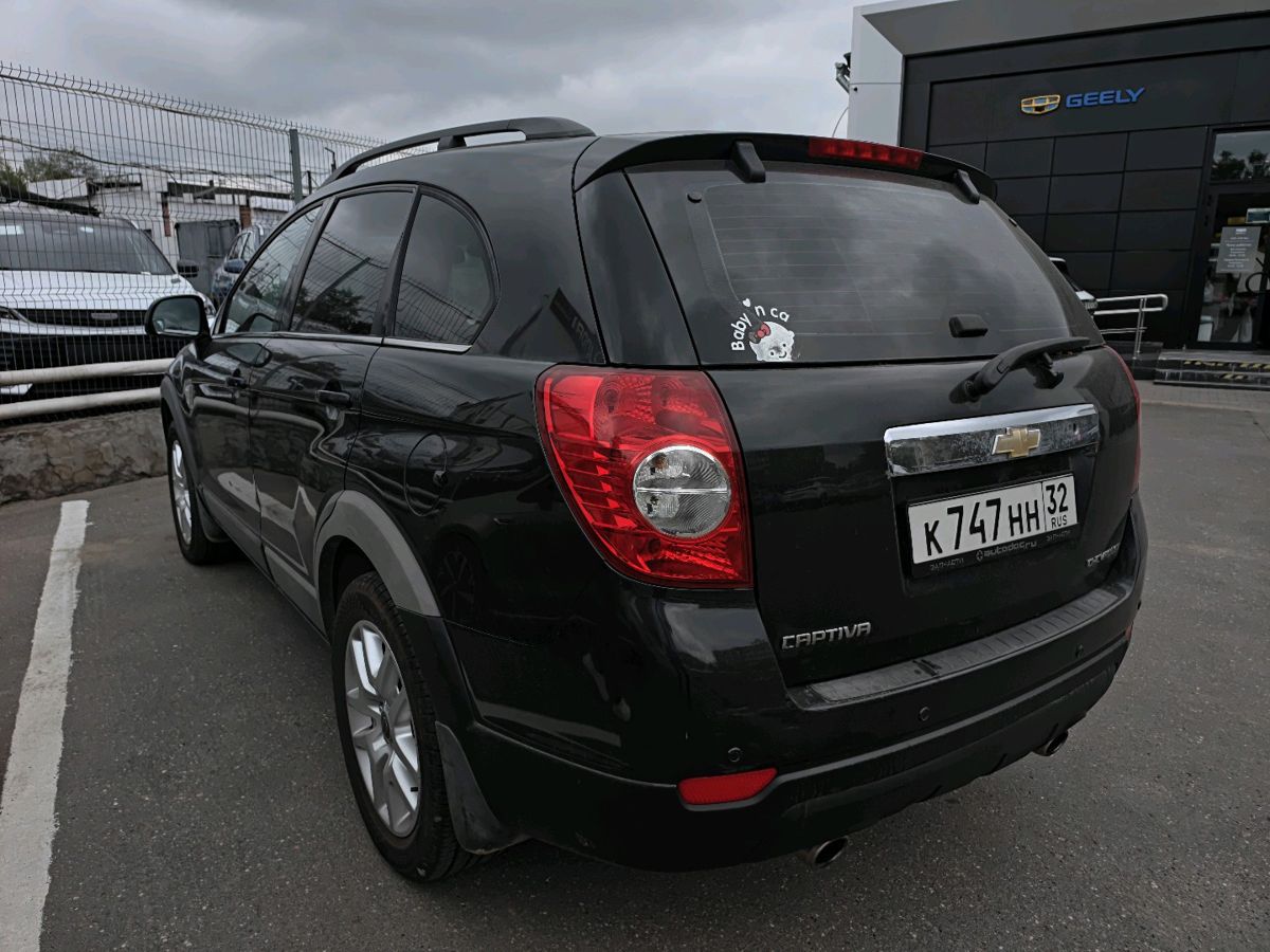 Chevrolet Captiva I поколение 2.4 AT (7 мест) (136 л.с.) LT 5-seats + Чёрный 2010 с пробегом 318 549 км