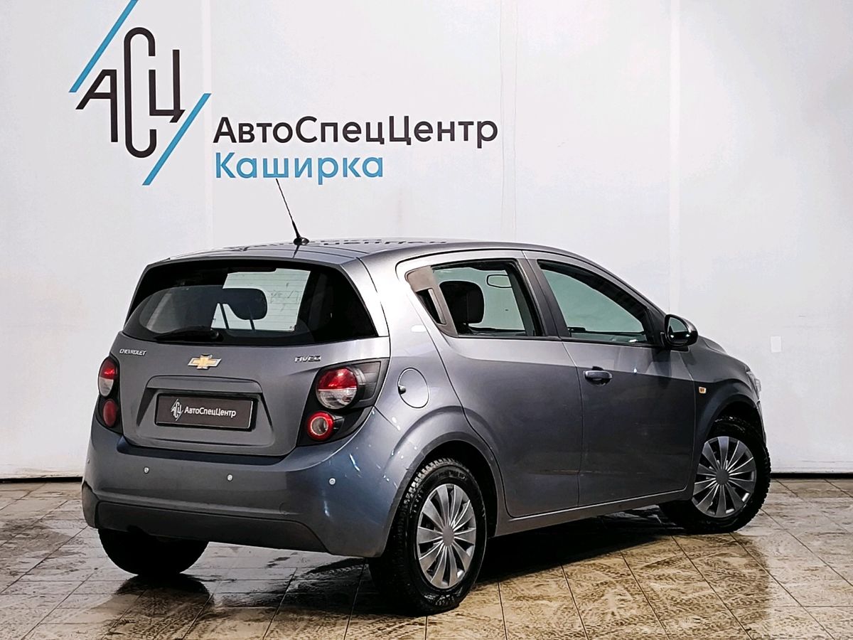 Автомобиль Chevrolet Aveo II поколение (T300) 1.6 AT (115 л.с.) LT Серый 2013 с пробегом 72 835 км