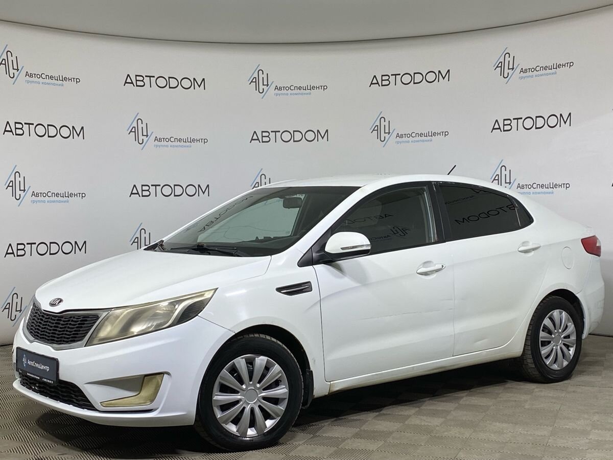 Kia Rio III поколение 1.6 5MT (123 л.с.) Luxe Белый 2013 с пробегом 308 962 км