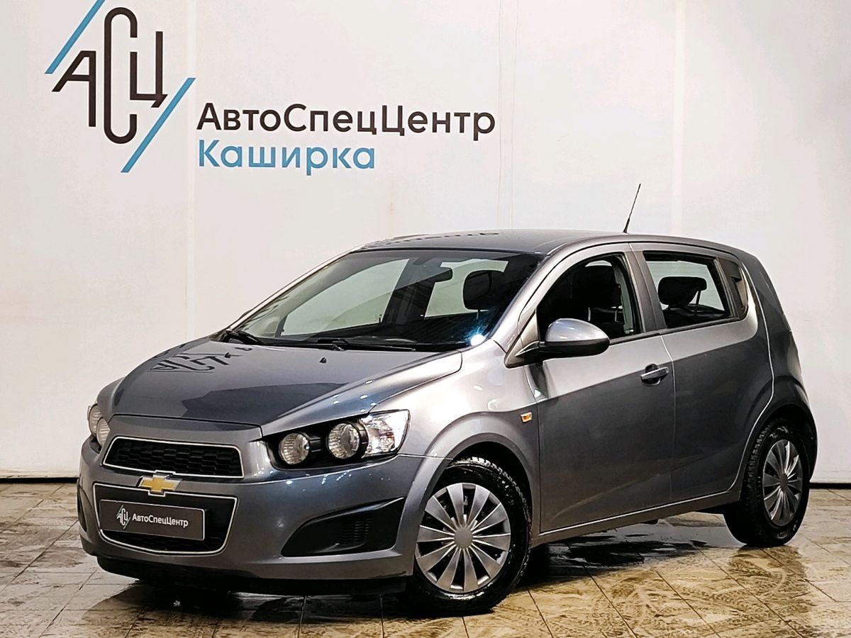 Автомобиль Chevrolet Aveo II поколение (T300) 1.6 AT (115 л.с.) LT Серый 2013 с пробегом 72 835 км
