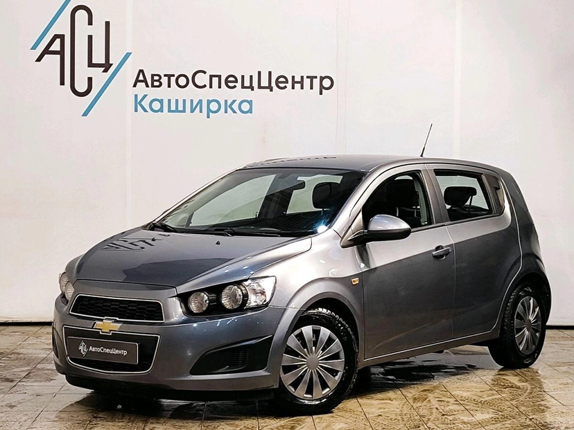 Автомобиль Chevrolet Aveo II поколение (T300) 1.6 AT (115 л.с.) LT Серый 2013 с пробегом 72 835 км