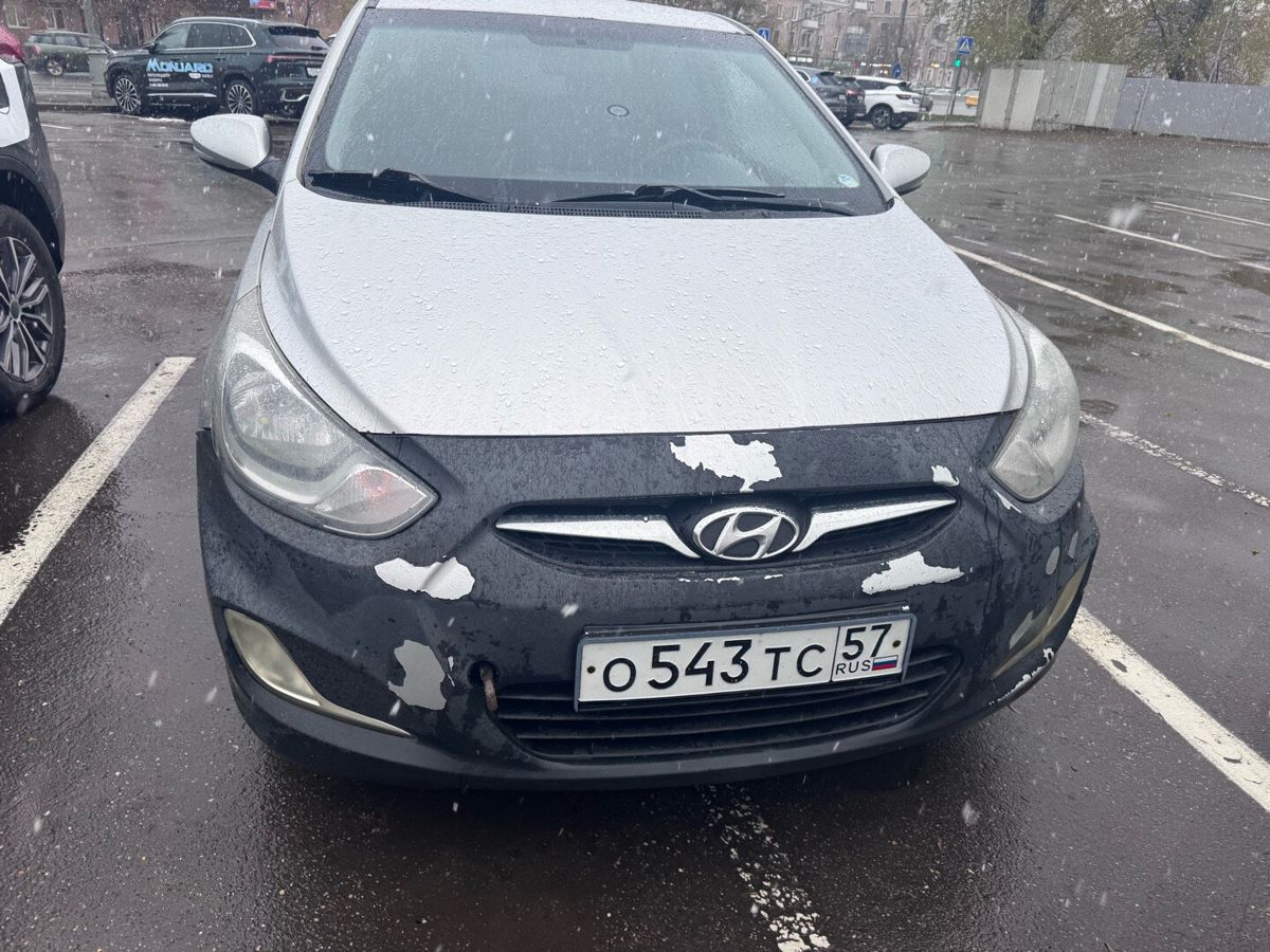 Hyundai Solaris I поколение 1.6 AT (123 л.с.) Style Серебристый 2011 с пробегом 457 239 км