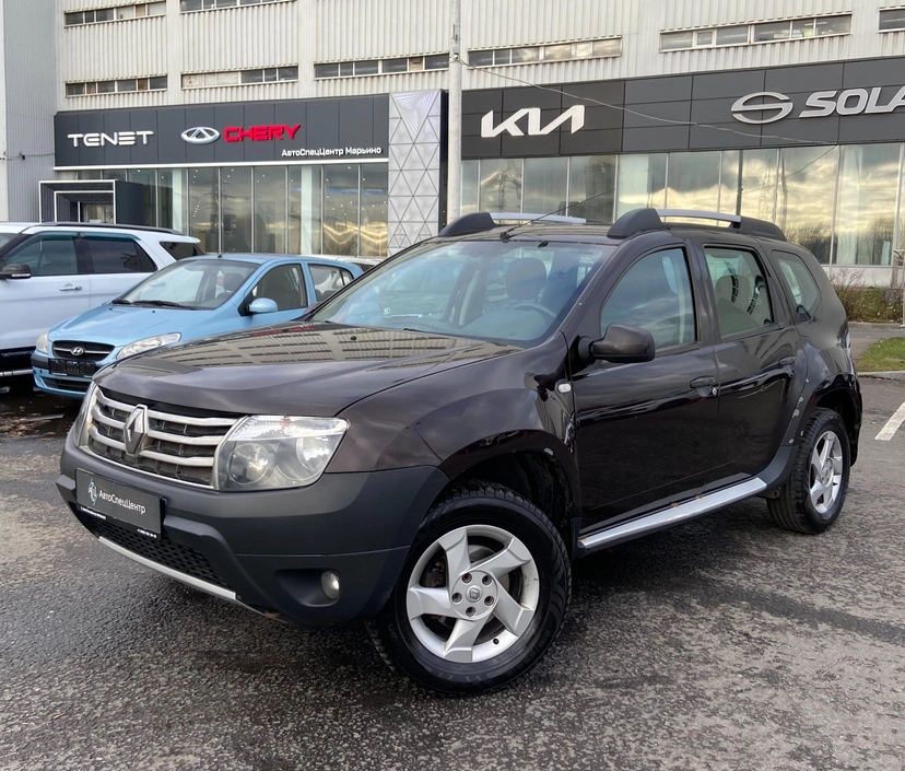 Автомобиль Renault Duster I поколение 2.0 AT 4WD (135 л.с.) Privilege Коричневый 2014 с пробегом 194 755 км