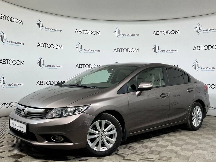 Автомобиль Honda Civic IX поколение 1.8 AT (142 л.с.) Lifestyle Коричневый 2012 с пробегом 231 385 км