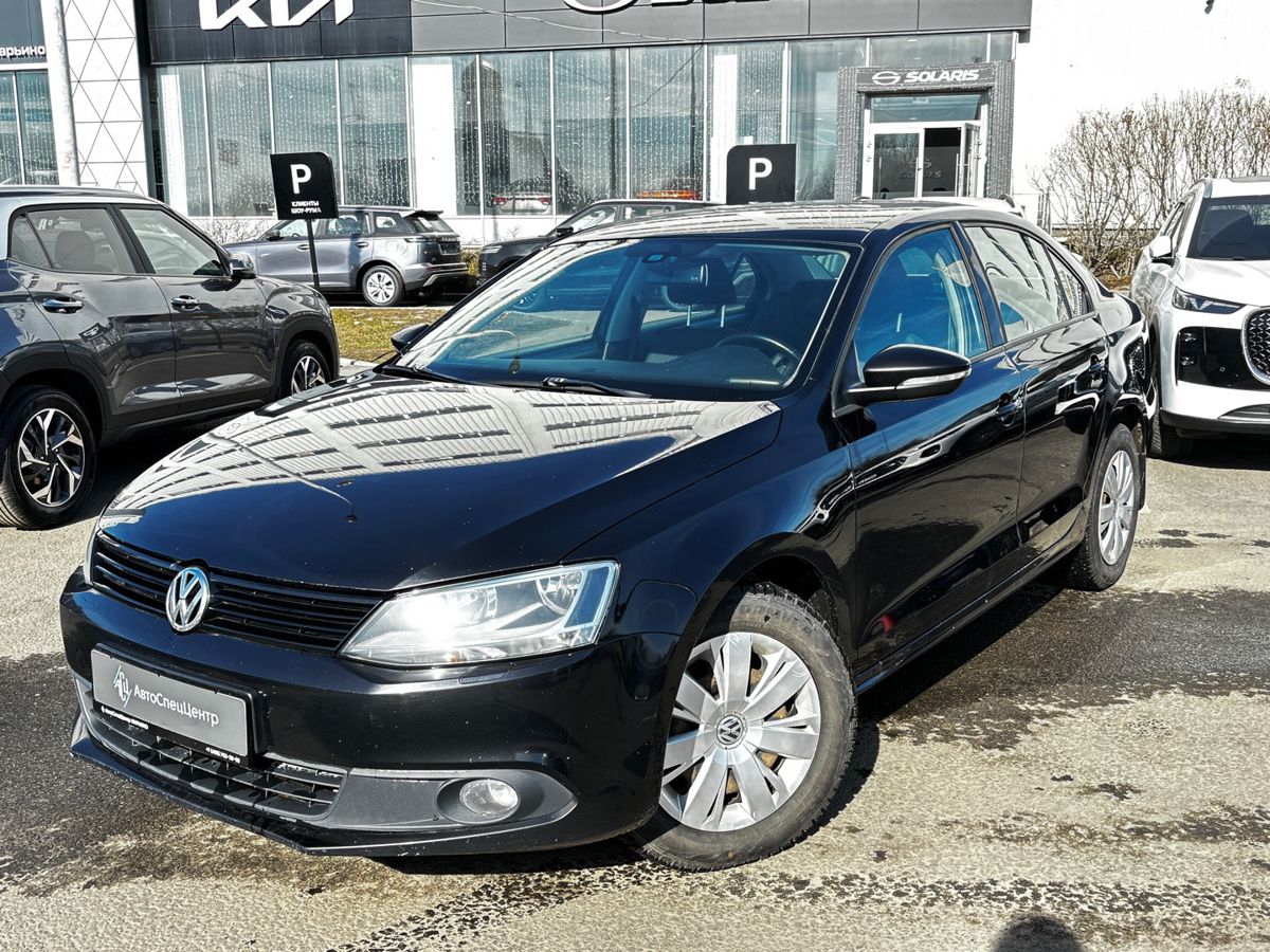 Автомобиль Volkswagen Jetta VI поколение 1.4 AMT (122 л.с.) Comfortline Чёрный 2012 с пробегом 157 000 км