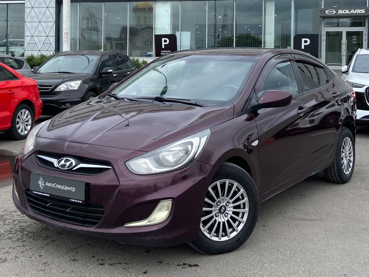 Hyundai Solaris I поколение 1.6 AT (123 л.с.) Family Фиолетовый 2011 с пробегом 356 000 км