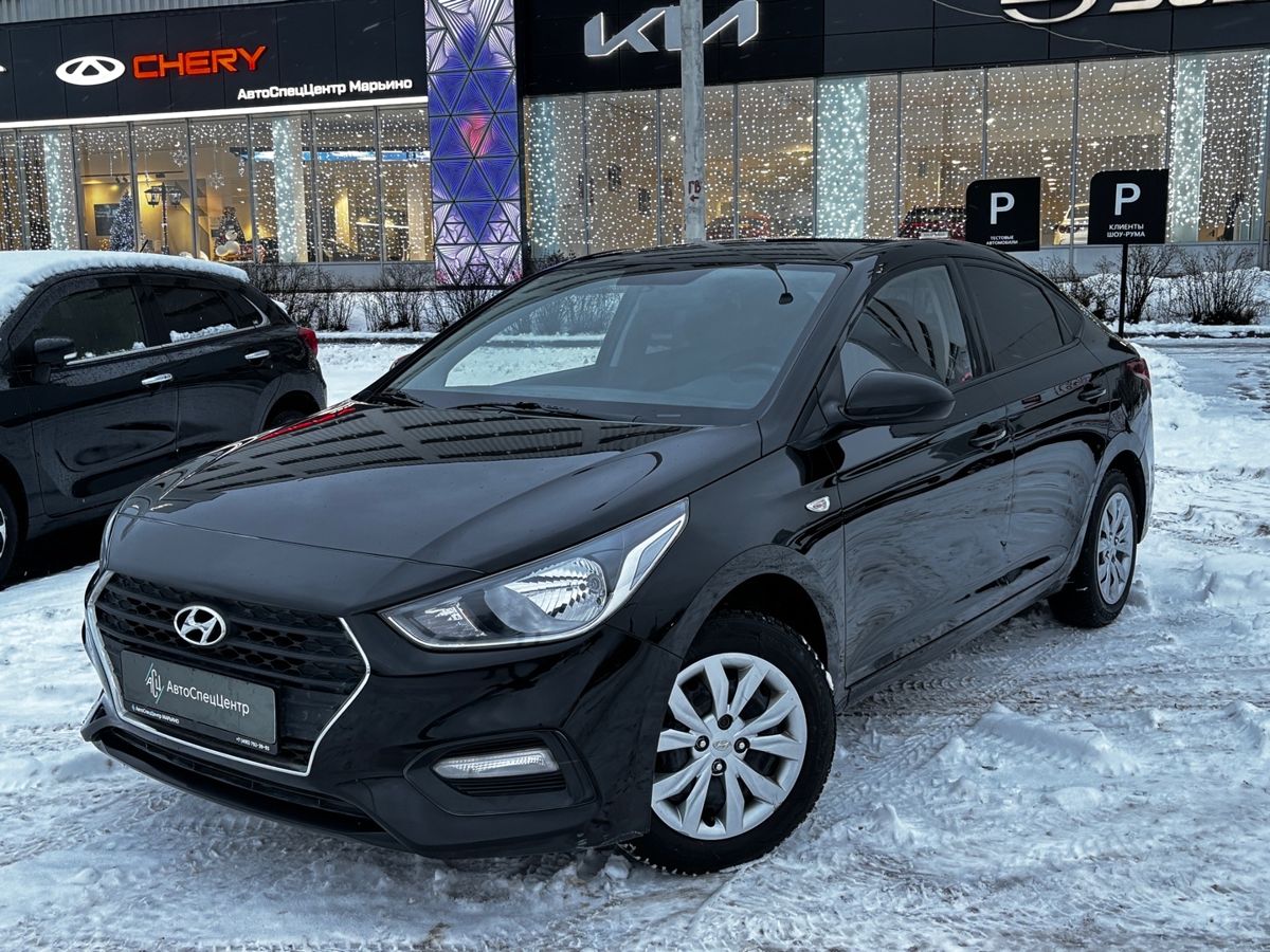 Автомобиль Hyundai Solaris II поколение 1.6 AT (123 л.с.) Comfort Чёрный 2019 с пробегом 99 000 км