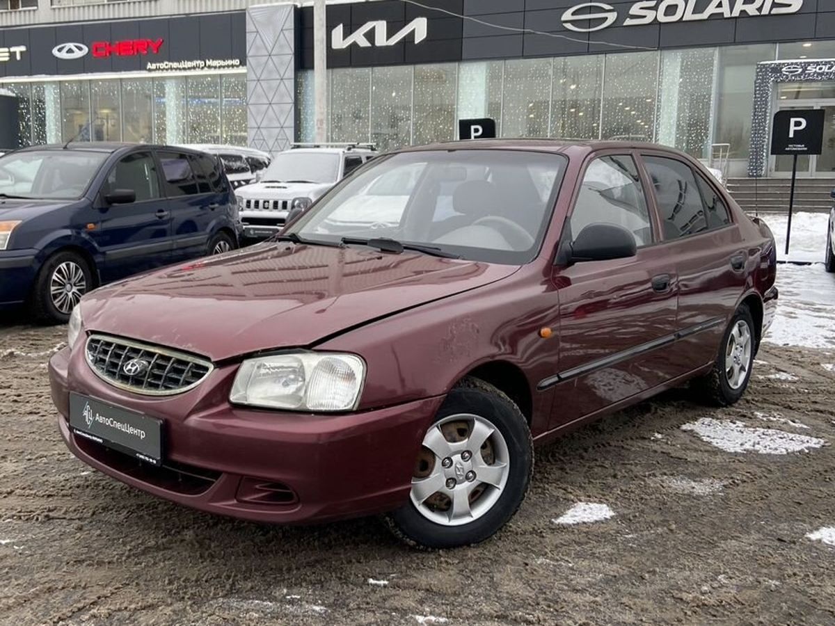 Автомобиль Hyundai Accent II поколение (LC) ТагАЗ 1.5 MT (102 л.с.) Base Красный 2010 с пробегом 315 000 км