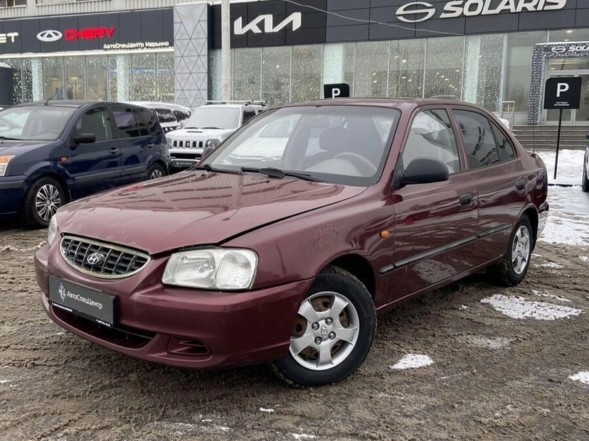 Автомобиль Hyundai Accent II поколение (LC) ТагАЗ 1.5 MT (102 л.с.) Base Красный 2010 с пробегом 315 000 км