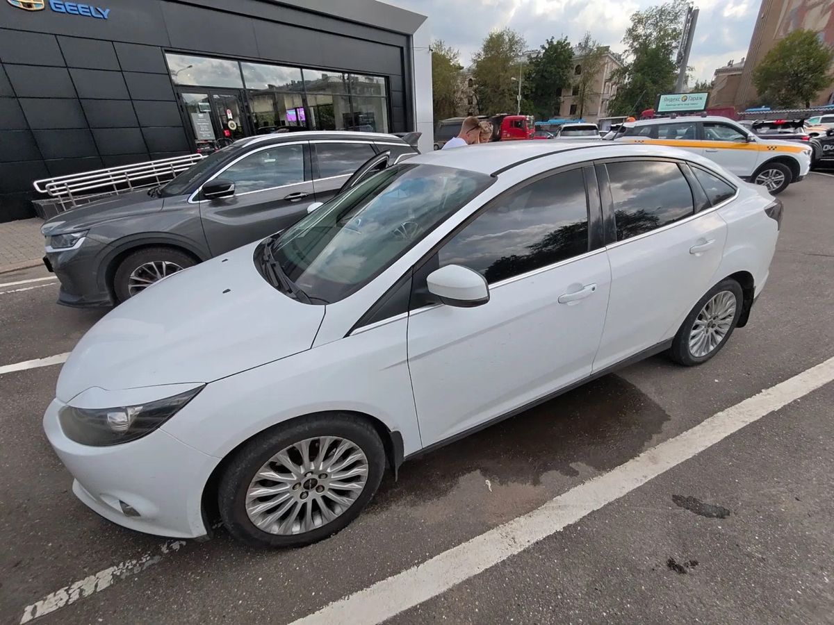 Ford Focus III поколение 2.0 AMT (150 л.с.) Titanium Белый 2014 с пробегом 197 645 км
