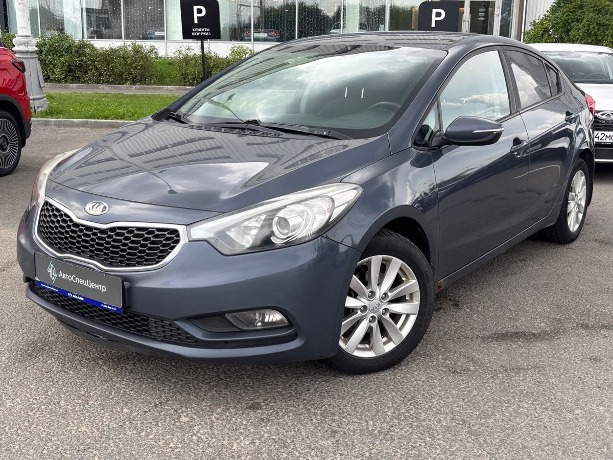 Kia Cerato III поколение 1.6 AT (130 л.с.) Prestige Синий 2013 с пробегом 240 000 км