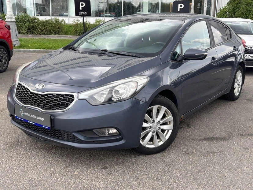 Kia Cerato III поколение 1.6 AT (130 л.с.) Prestige Синий 2013 с пробегом 240 000 км