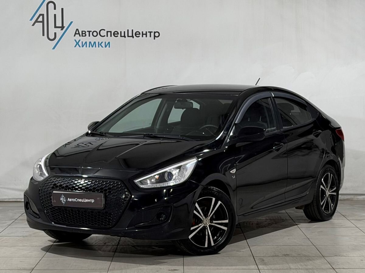 Hyundai Solaris I поколение 1.6 AT (123 л.с.) Comfort Чёрный 2013 с пробегом 145 000 км