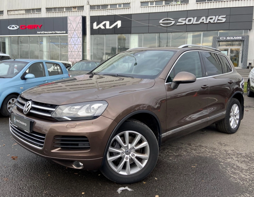Автомобиль Volkswagen Touareg II поколение 3.0d AT 4WD (204 л.с.) V6 TDI Коричневый 2012 с пробегом 182 812 км