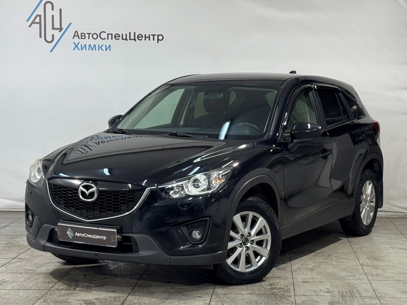 Автомобиль Mazda CX-5 I поколение 2.0 AT 4WD (160 л.с.) Base Чёрный 2014 с пробегом 125 000 км