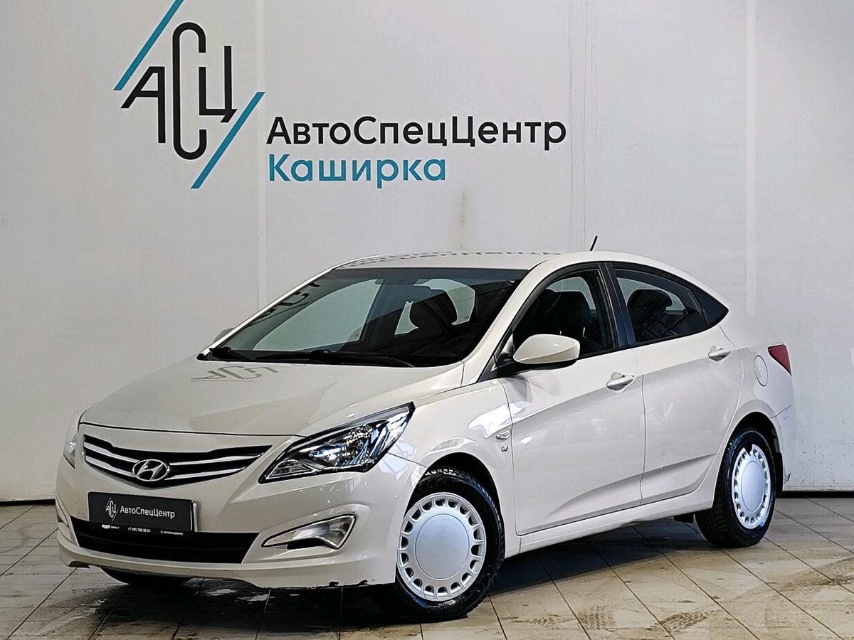 Автомобиль Hyundai Solaris I [рестайлинг] 1.6 AT (123 л.с.) Comfort Бежевый 2015 с пробегом 89 655 км