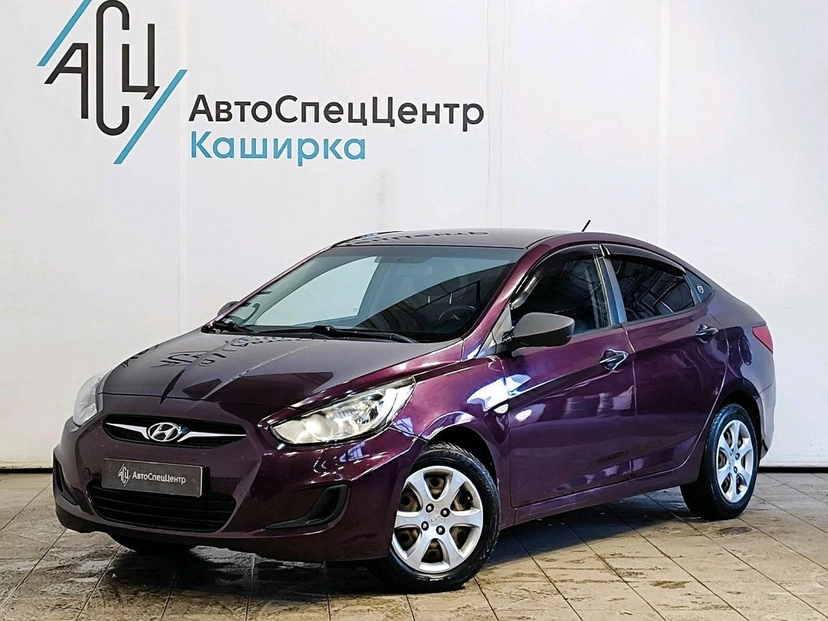 Автомобиль Hyundai Solaris I поколение 1.4 MT (107 л.с.) Comfort Фиолетовый 2013 с пробегом 142 296 км