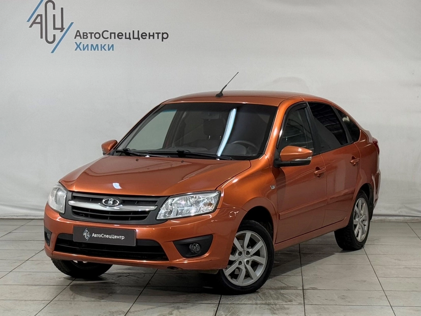 Автомобиль Lada (ВАЗ) Granta I поколение 1.6 MT (106 л.с.) Luxe Prestige 21917-52-008 Оранжевый 2015 с пробегом 92 000 км