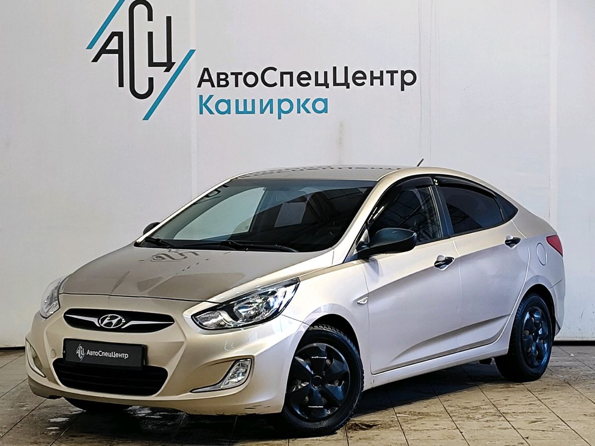 Автомобиль Hyundai Solaris I поколение 1.4 AT (107 л.с.) Comfort Бежевый 2012 с пробегом 131 266 км