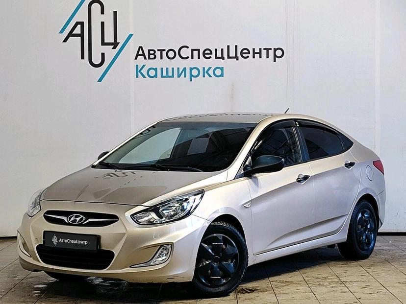 Автомобиль Hyundai Solaris I поколение 1.4 AT (107 л.с.) Comfort Бежевый 2012 с пробегом 131 266 км