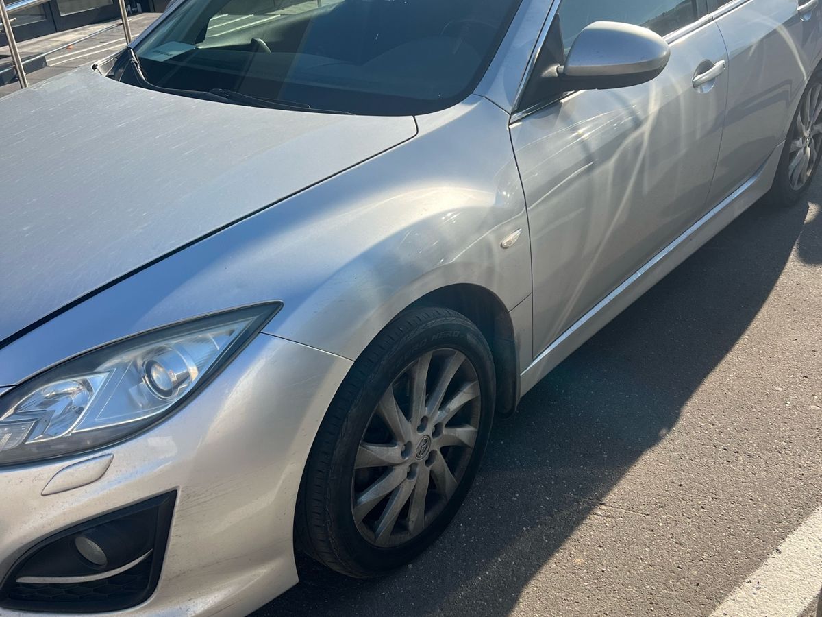 Mazda 6 II (GH) [рестайлинг] 2.0 AT (147 л.с.) Sport Серебристый 2011 с пробегом 230 137 км