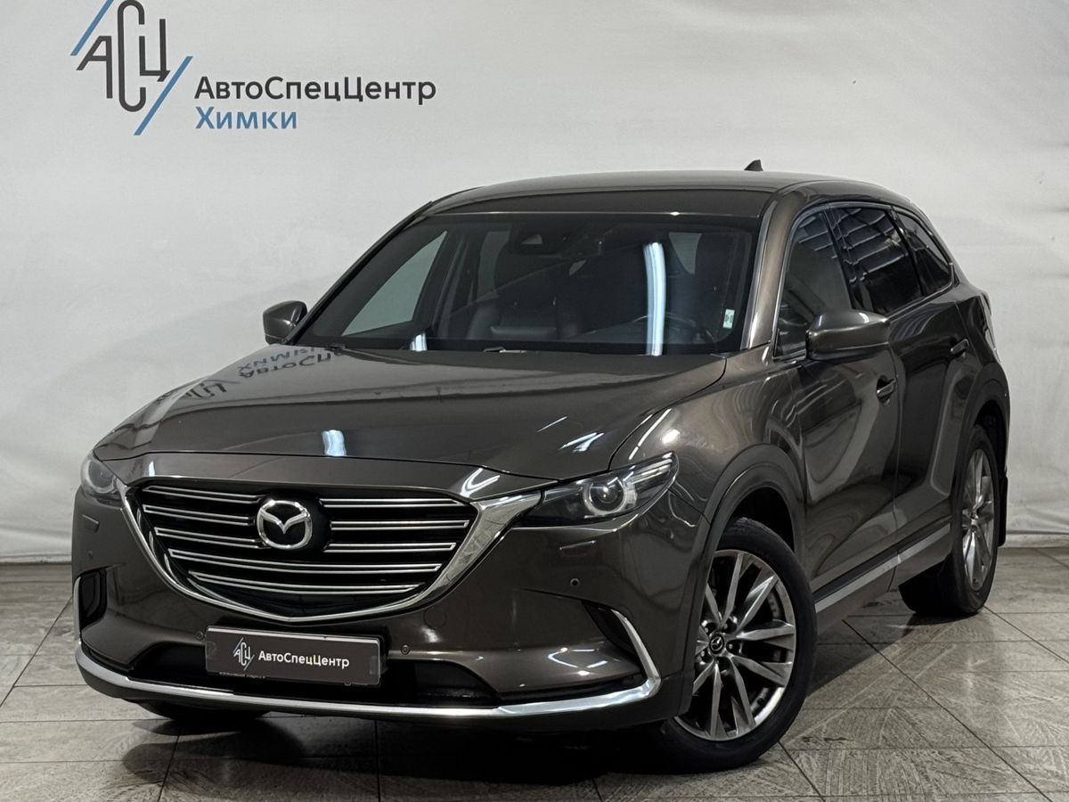 Автомобиль Mazda CX-9 II поколение 2.5 AT 4WD (231 л.с.) Supreme Коричневый 2018 с пробегом 114 000 км