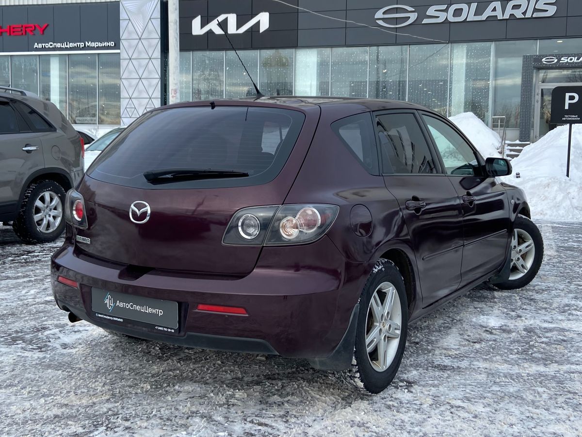 Автомобиль Mazda 3 I (BK) [рестайлинг] 1.6 MT (105 л.с.) Touring Красный 2007 с пробегом 138 100 км