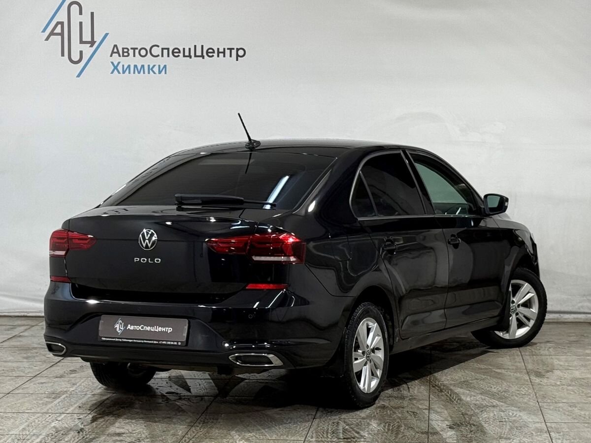 Автомобиль Volkswagen Polo VI поколение 1.4 AMT (125 л.с.) Exclusive Чёрный 2022 с пробегом 51 000 км