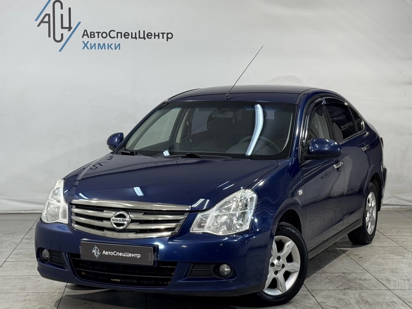 Автомобиль Nissan Almera III поколение (G15) 1.6 AT (102 л.с.) Tekna Синий 2014 с пробегом 103 000 км