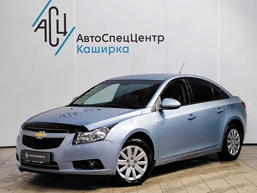 Автомобиль Chevrolet Cruze I поколение (J300) 1.6 MT (109 л.с.) LS Серебристый 2011 с пробегом 203 211 км