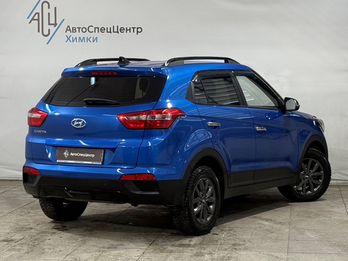 Автомобиль Hyundai Creta I [рестайлинг] 1.6 AT (123 л.с.) Travel + Advanced Синий 2021 с пробегом 138 000 км