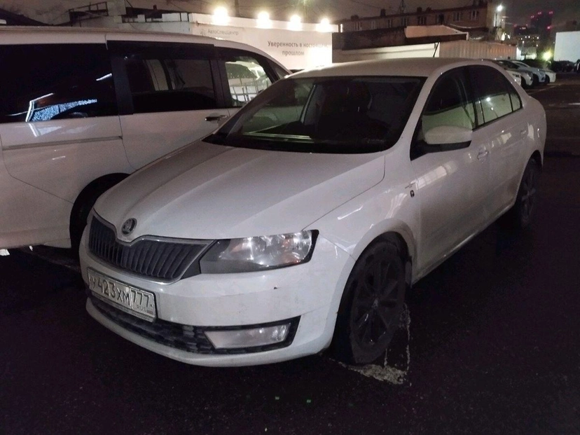 Автомобиль Skoda Rapid I поколение 1.6 MT (90 л.с.) Ambition Белый 2016 с пробегом 105 571 км
