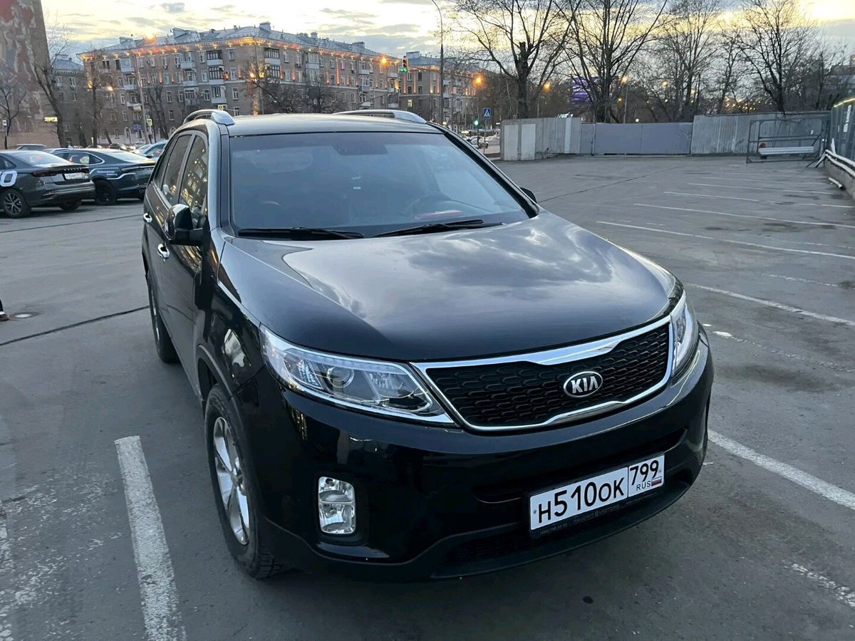 Автомобиль Kia Sorento II [рестайлинг] 2.2d AT 4WD (197 л.с.) New Comfort (2015) Чёрный 2019 с пробегом 31 136 км