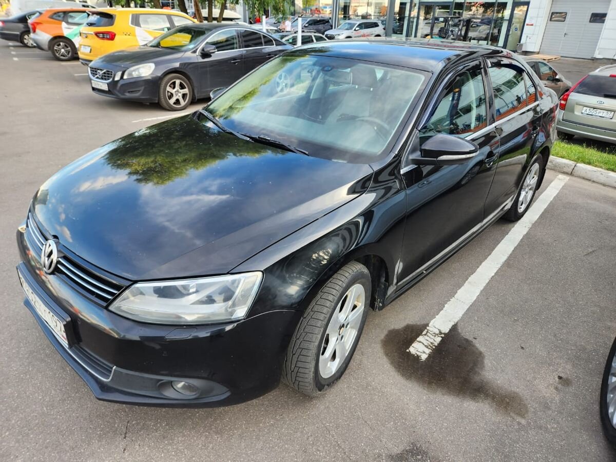 Купить Volkswagen Jetta 2012, 1.4 AMT (150 л.с.) Чёрный с пробегом 226129 км / 6019686 по цене от 890 000 руб в АвтоСпецЦентр - официальный дилер в Москве